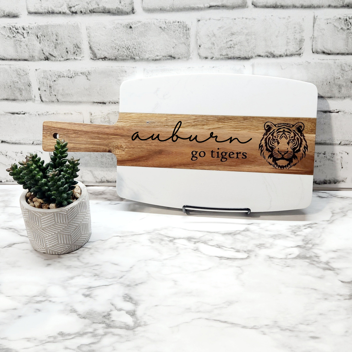 Auburn Tigers engraved marble and acacia wood charcuterie board – college football fan gift